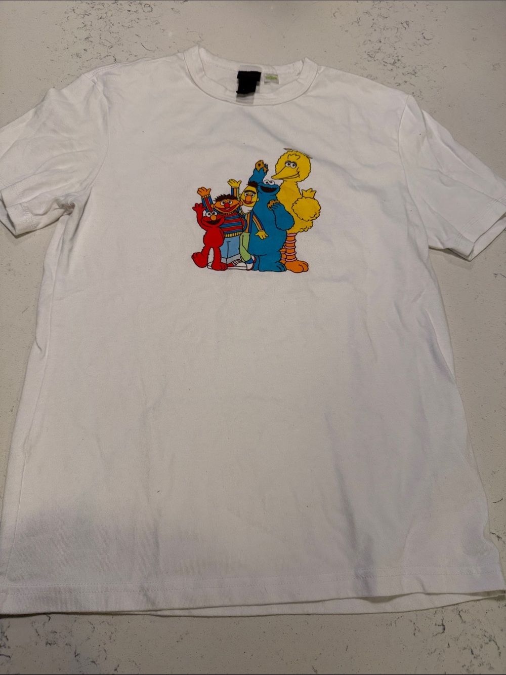 H&M White Tee with Colorful Sesame Street Crew Graphic